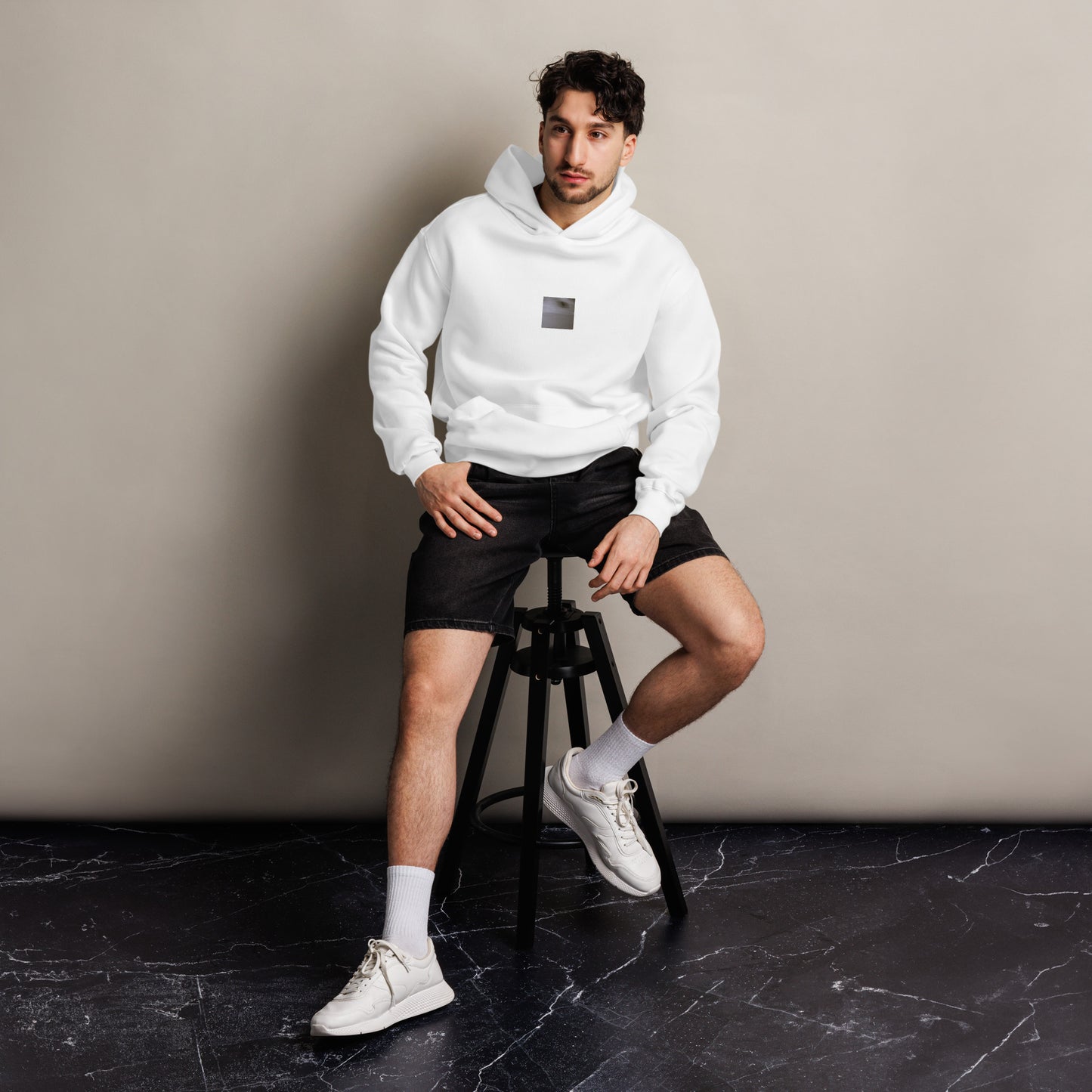 Minimalist streetwear style oversized hoodie in white featuring the 'Cat (B&W)' photo art on the front. / モードストリート系オーバーサイズフーディー（ホワイト）フロントに「猫（モノクロ）」のフォトアートを配したデザイン。