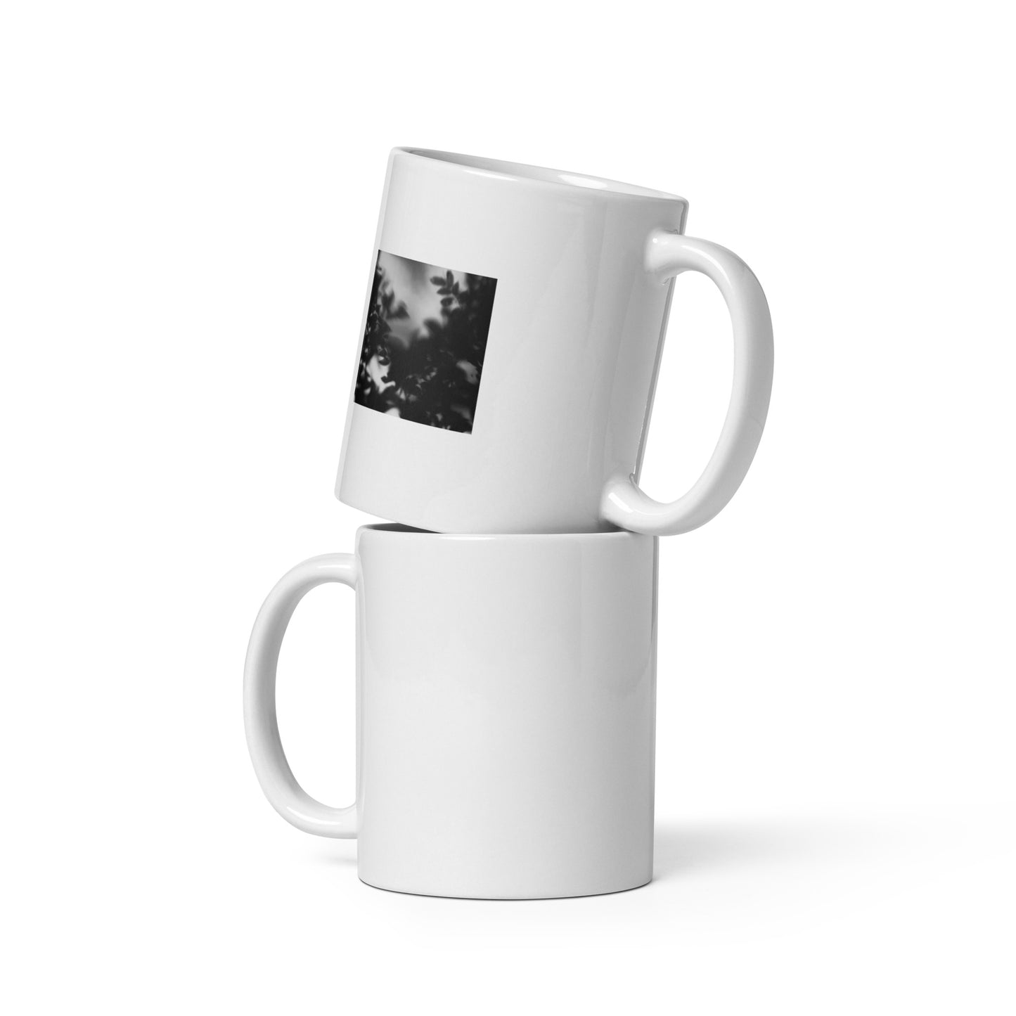 Minimalist streetwear style ceramic mug featuring a striking black and white 'Tree Branches' photograph. Glossy finish, 11 oz capacity, dishwasher and microwave safe. A sophisticated botanical accent for modern living. / モードストリート系デザインの「Tree Branches」モノクロ写真プリントが施されたセラミックマグカップ。光沢仕上げ、容量11oz。洗練されたモダンな空間を演出するボタニカル・アクセント。
