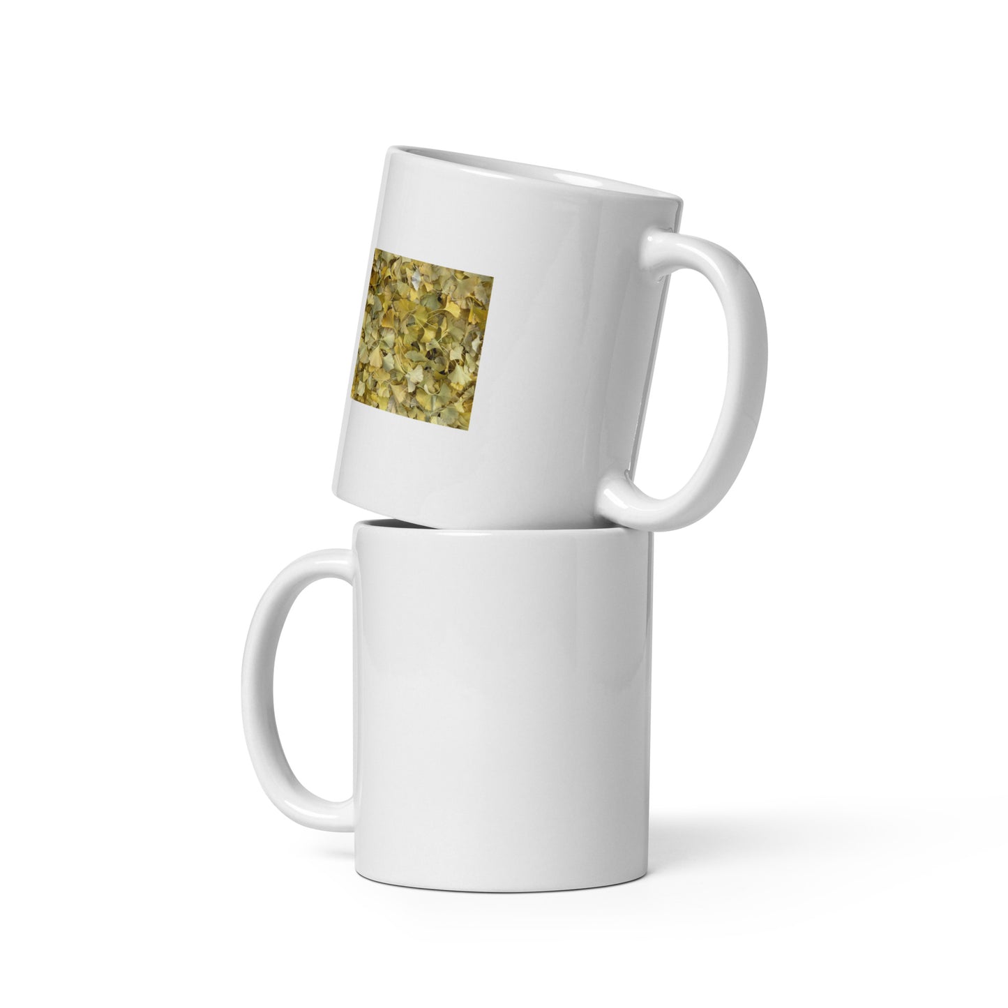 Minimalist art white glossy mug featuring the 'Ginkgo Leaves' photo art. / ホワイト光沢マグカップ：「イチョウの葉」のフォトアートを配したミニマリストデザイン。